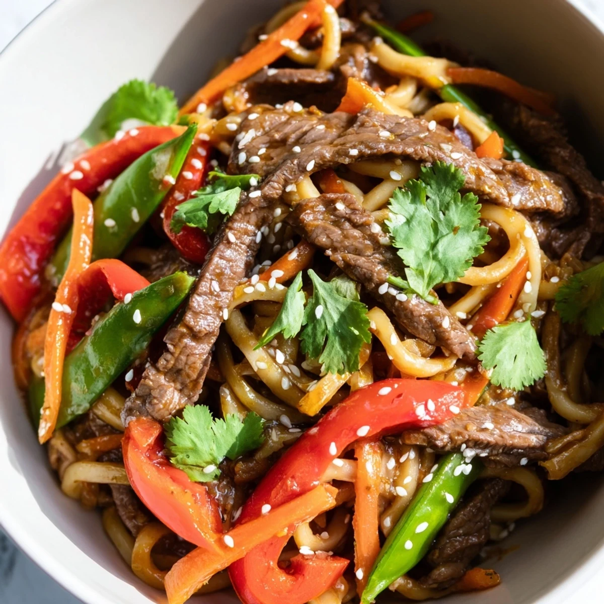 Homemade Spicy Beef Noodles tossed with wheat noodles, fresh vegetables, and a spicy chili garlic sauce, ready to serve hot.