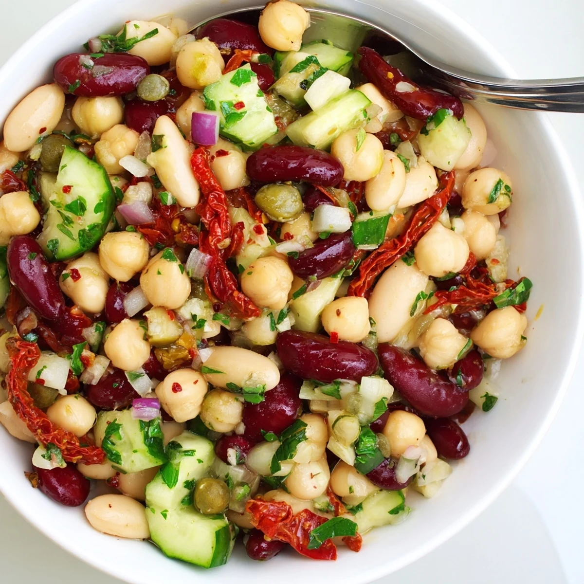 Chunky Dense Bean Salad With Sun Dried Tomatoes served chilled with crusty bread