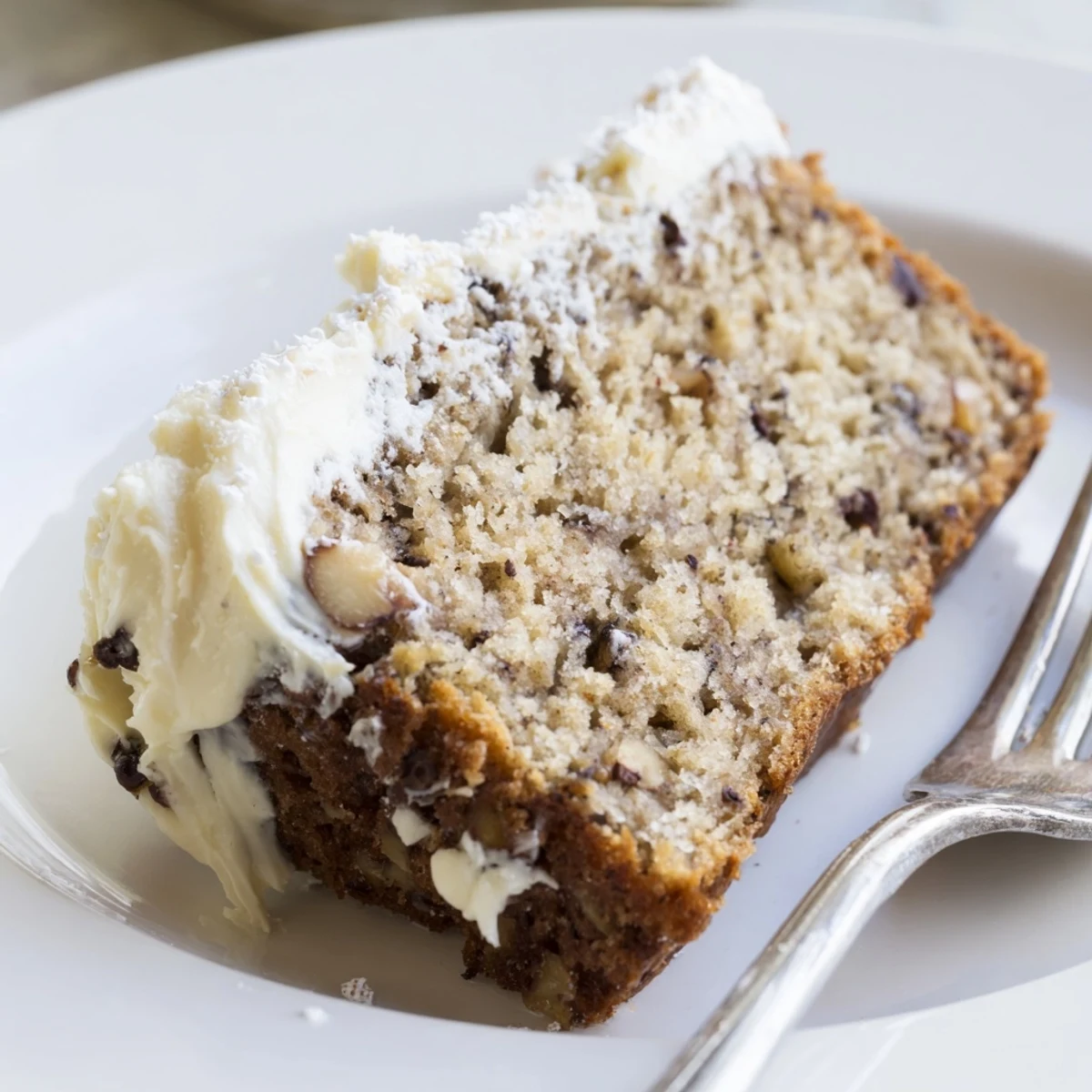 Freshly baked Banana Bread Cake Recipe studded with walnuts, tender and fragrant.